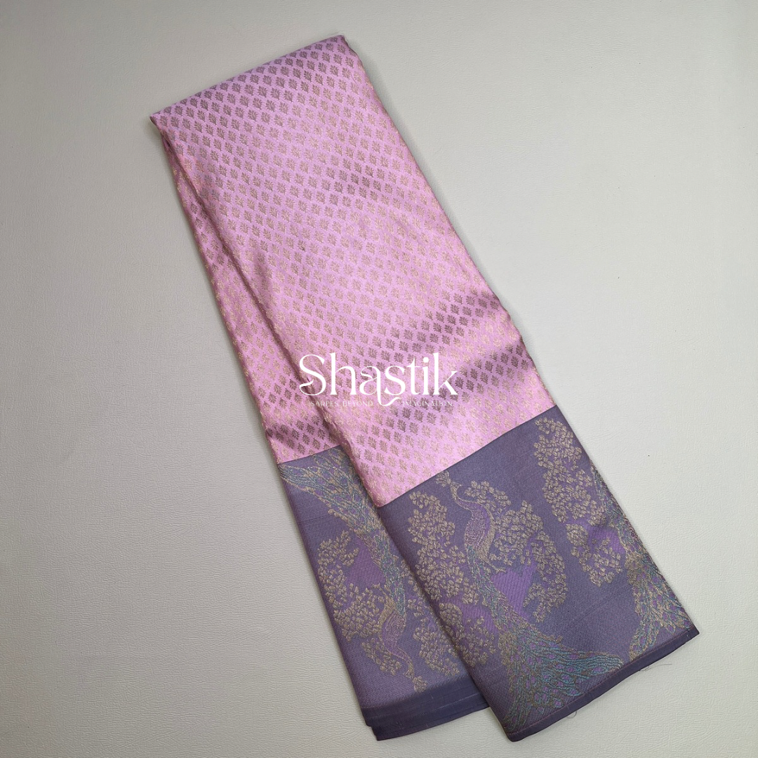 The Royal Peacock silk saree in salmon pink and purple mauve