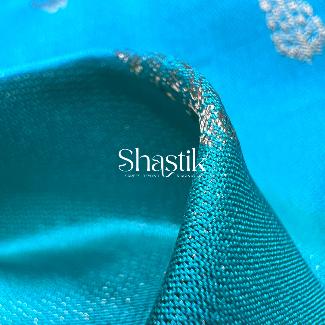 Bridal silk saree in turquoise with Ram-Sita and temple pallu.