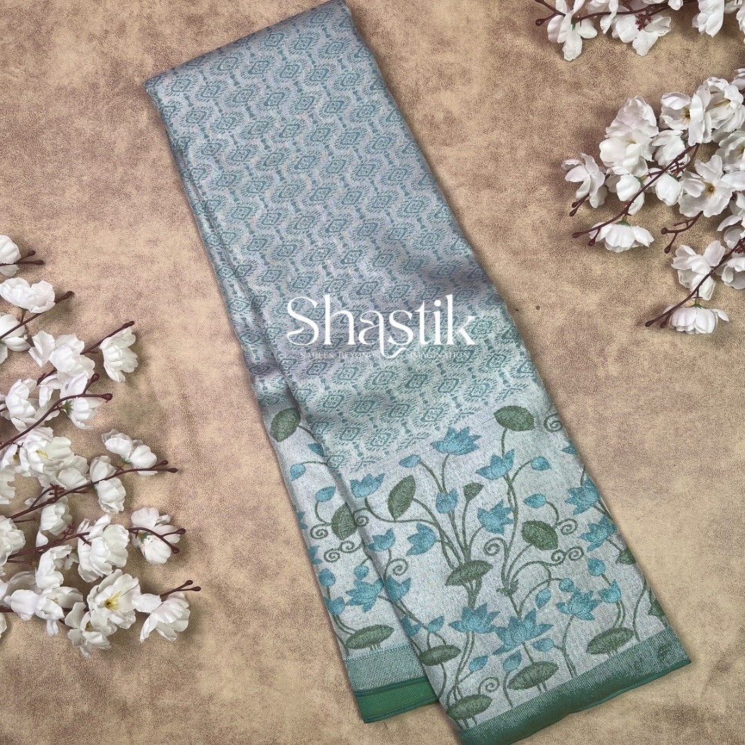 The blooming lotus silk saree in silver and blue