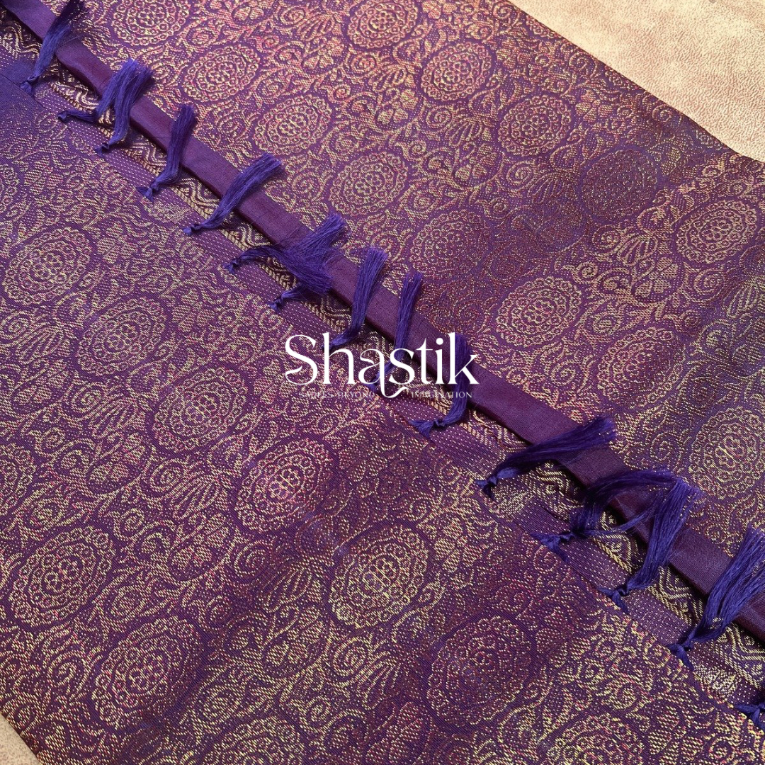 Purple bridal silk saree with leaf motifs in pallu