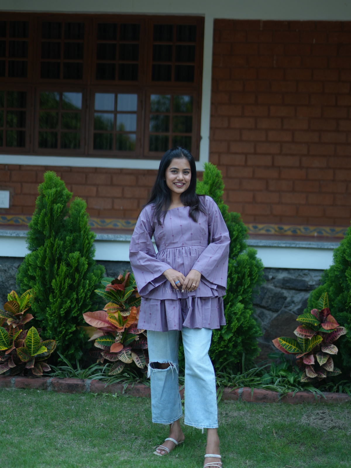 Tiered bell sleeved peplum top